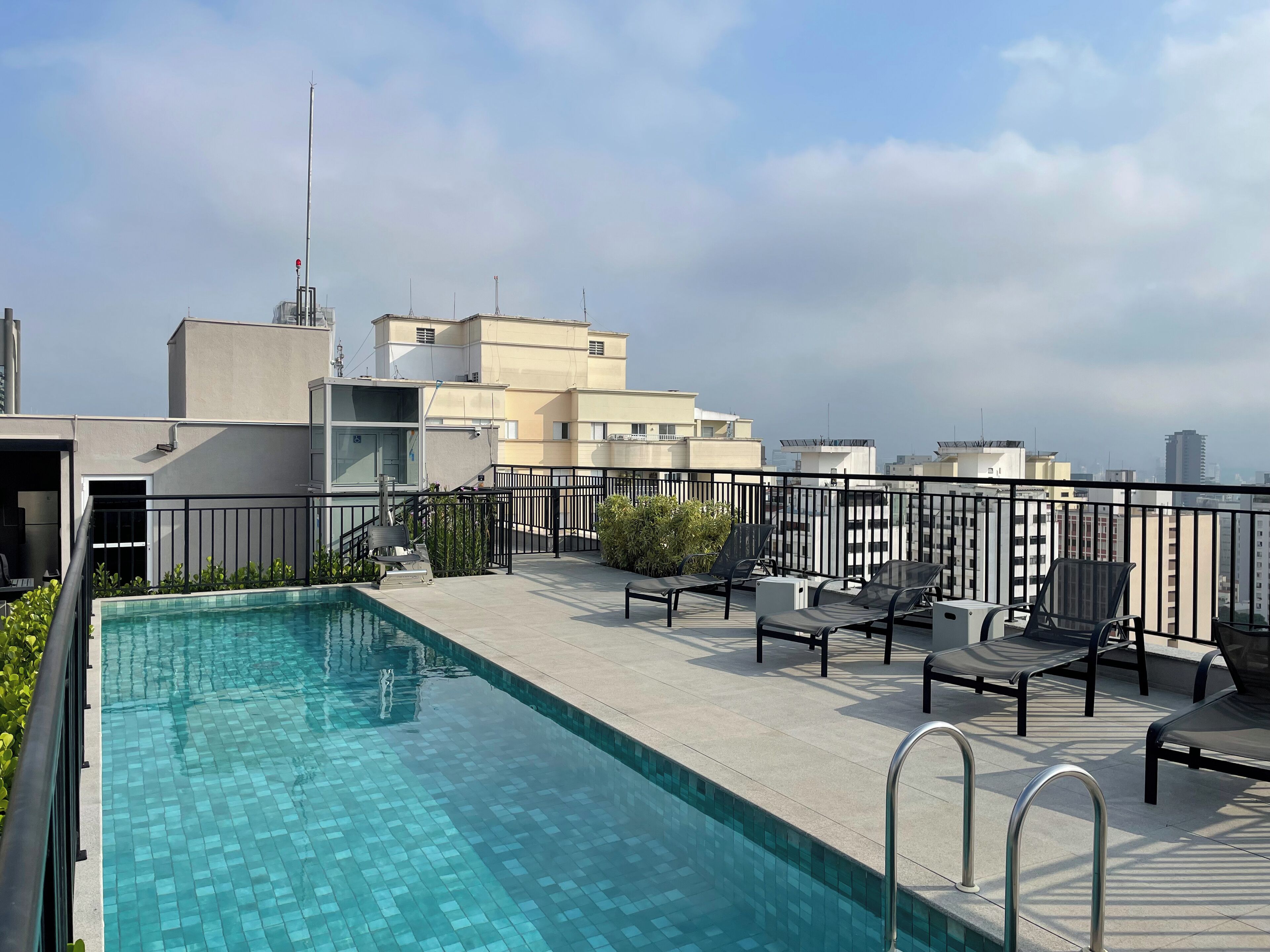 Outdoor pool, pool umbrellas, sun loungers