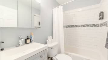 Hair dryer, towels, soap, shampoo