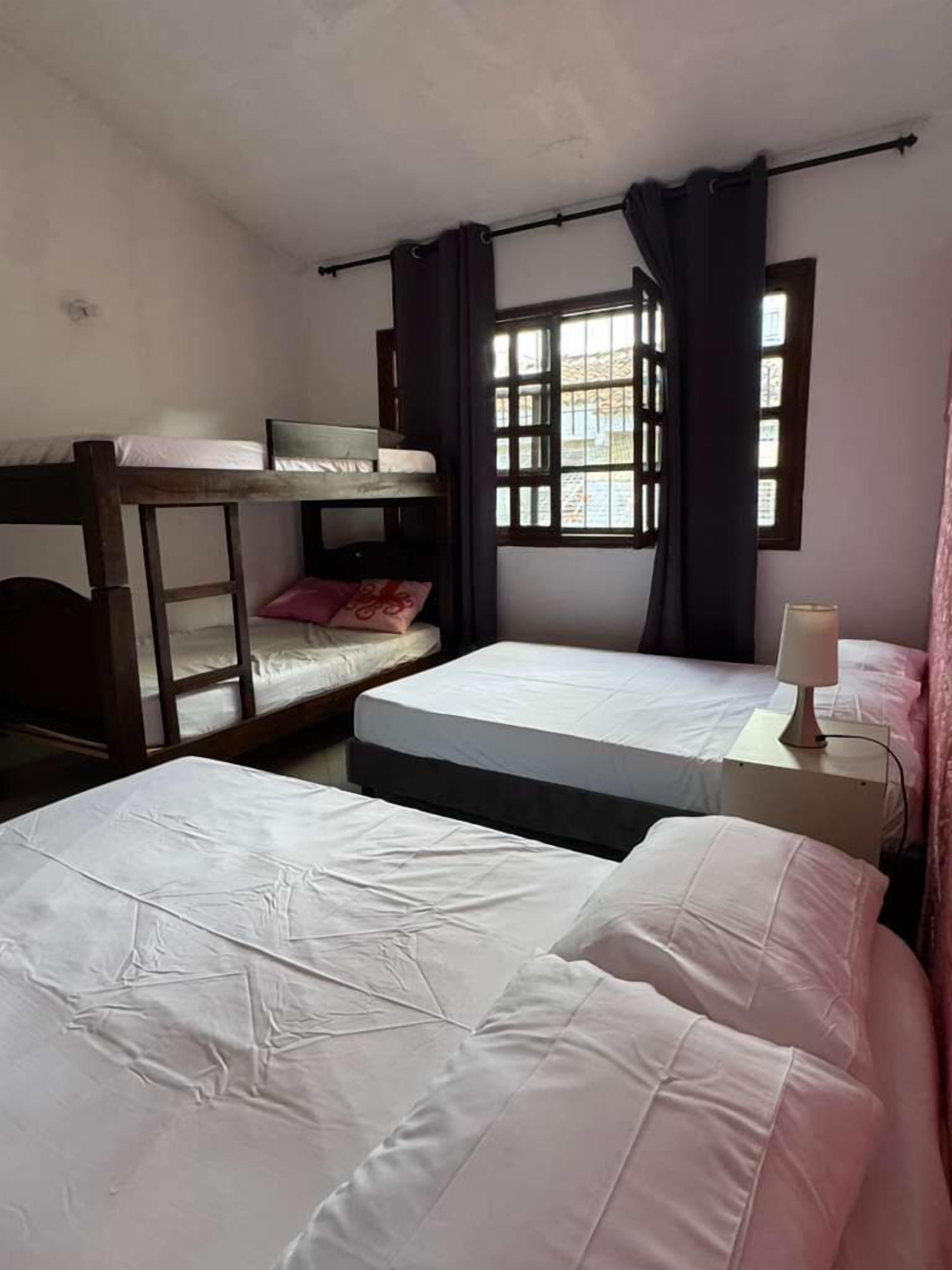 Classic Quadruple Room, Courtyard View | Blackout drapes, iron/ironing board, free WiFi