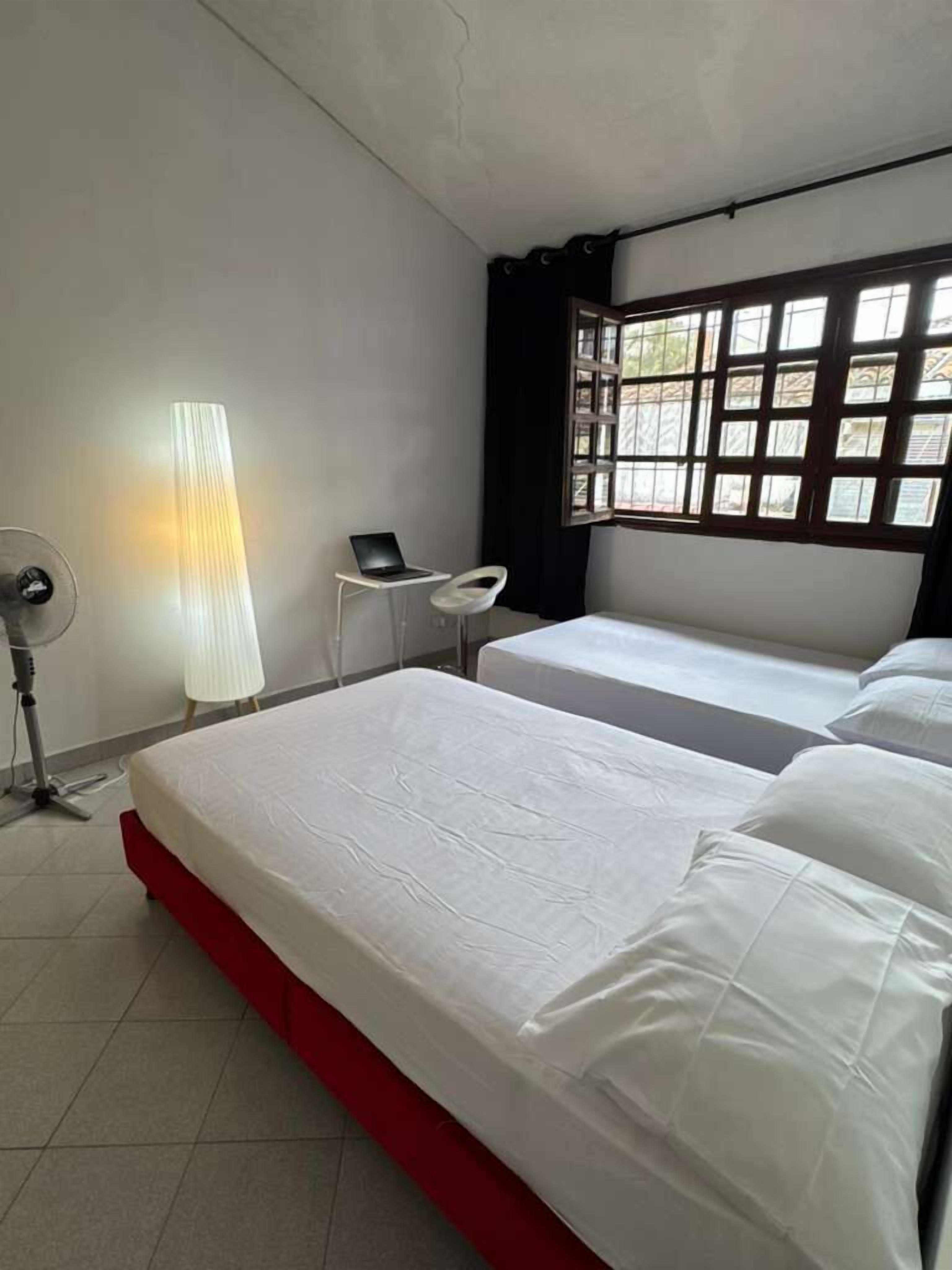 Triple Room, Courtyard View | Blackout drapes, iron/ironing board, free WiFi