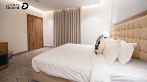 In-room safe, desk, laptop workspace, soundproofing - Super Luxury One bedroom Al Aqiq (Riyadh)