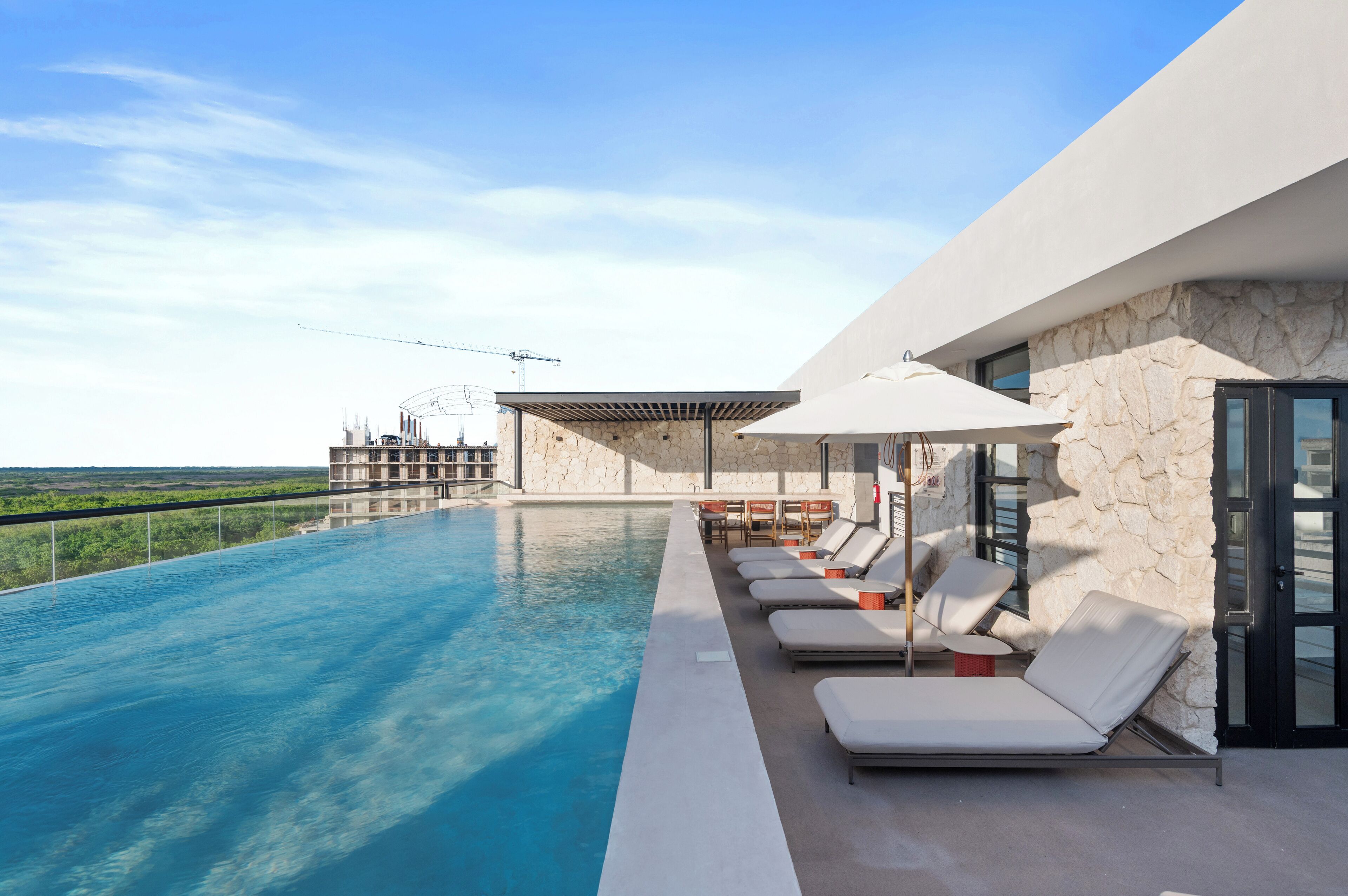 2 outdoor pools, pool umbrellas, sun loungers