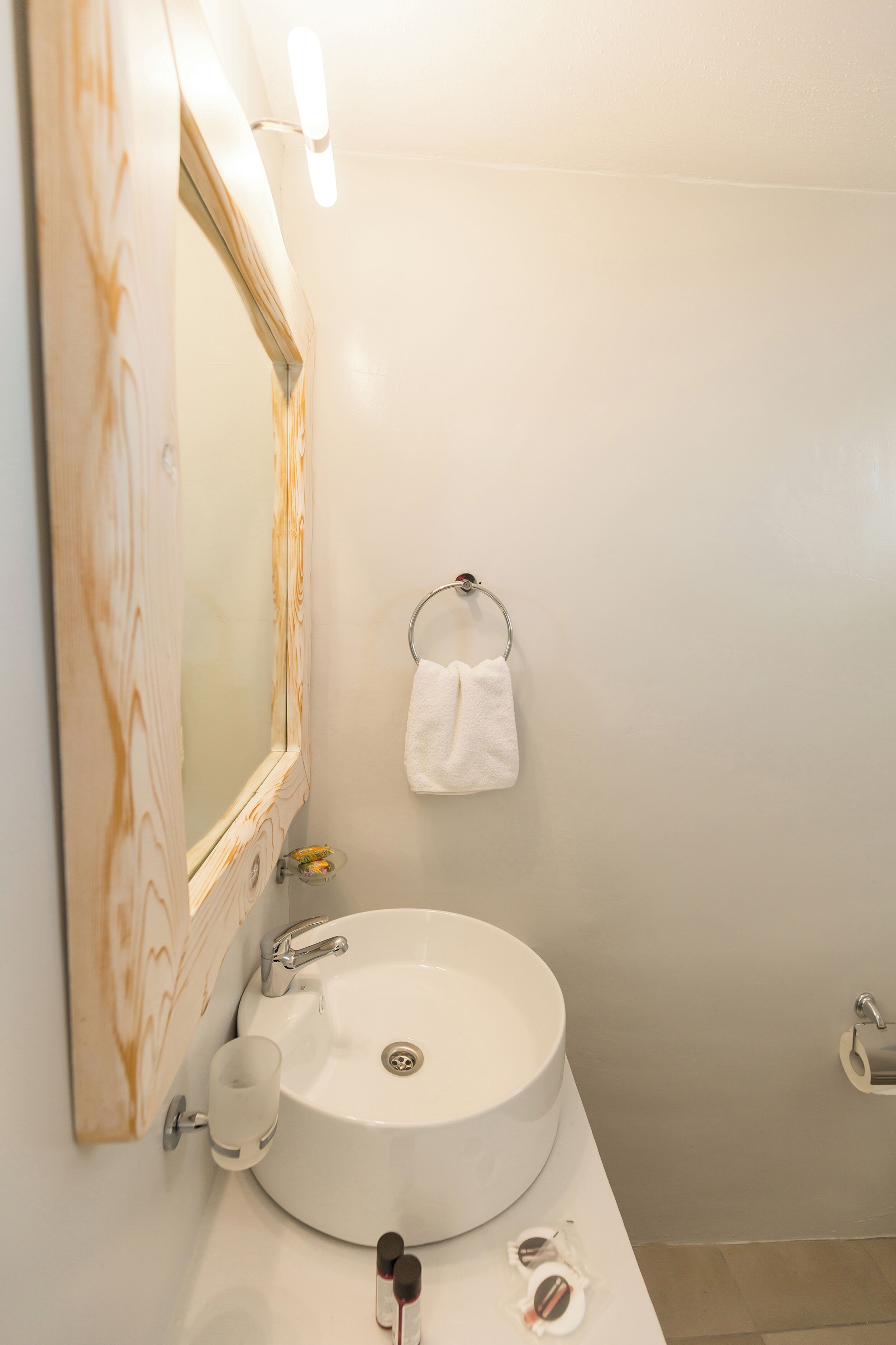 Shower, hair dryer, slippers, towels