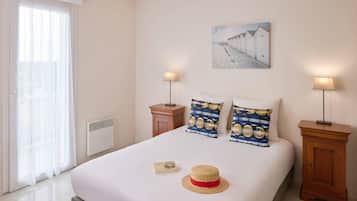 Apartamento | Wi-Fi de cortesia, roupa de cama