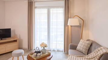 Apartamento (Upgrade) | Wi-Fi de cortesia, roupa de cama