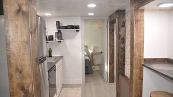 Microwave, stovetop, dishwasher, coffee/tea maker