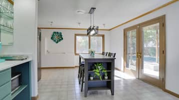 Fridge, microwave, coffee/tea maker, cookware/dishes/utensils