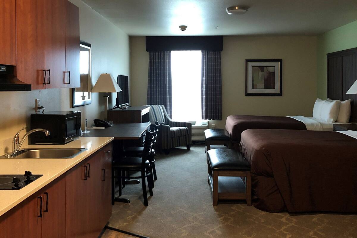 Studio, 2 Queen Beds, Kitchen | Desk, laptop workspace, blackout drapes, iron/ironing board