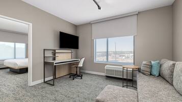 Suite, 1 Bedroom, Non Smoking | Desk, laptop workspace, blackout drapes, iron/ironing board