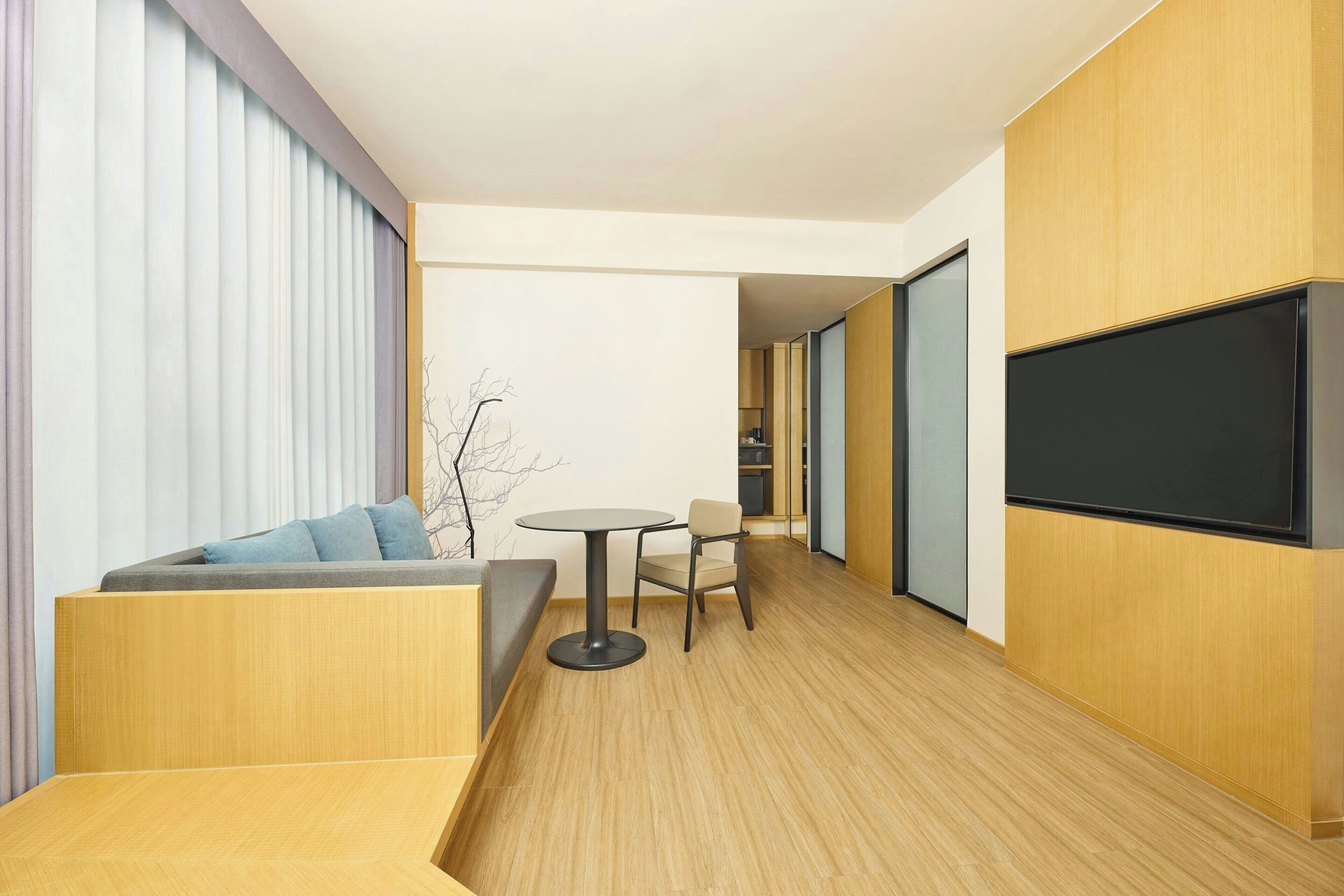 Standard Room, 1 King Bed, City View | Living room | 55-inch LCD TV with satellite channels