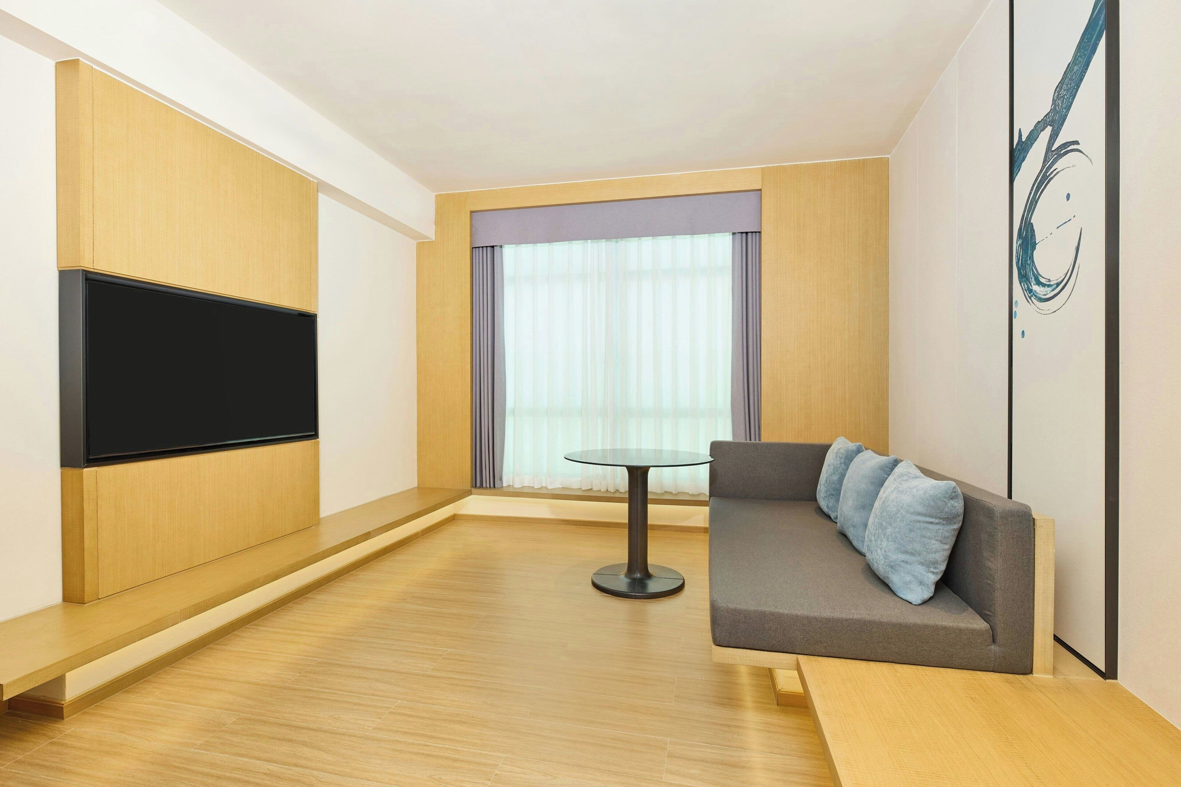Premium Room, 1 Bedroom, Lake View | Living room | 55-inch LCD TV with satellite channels