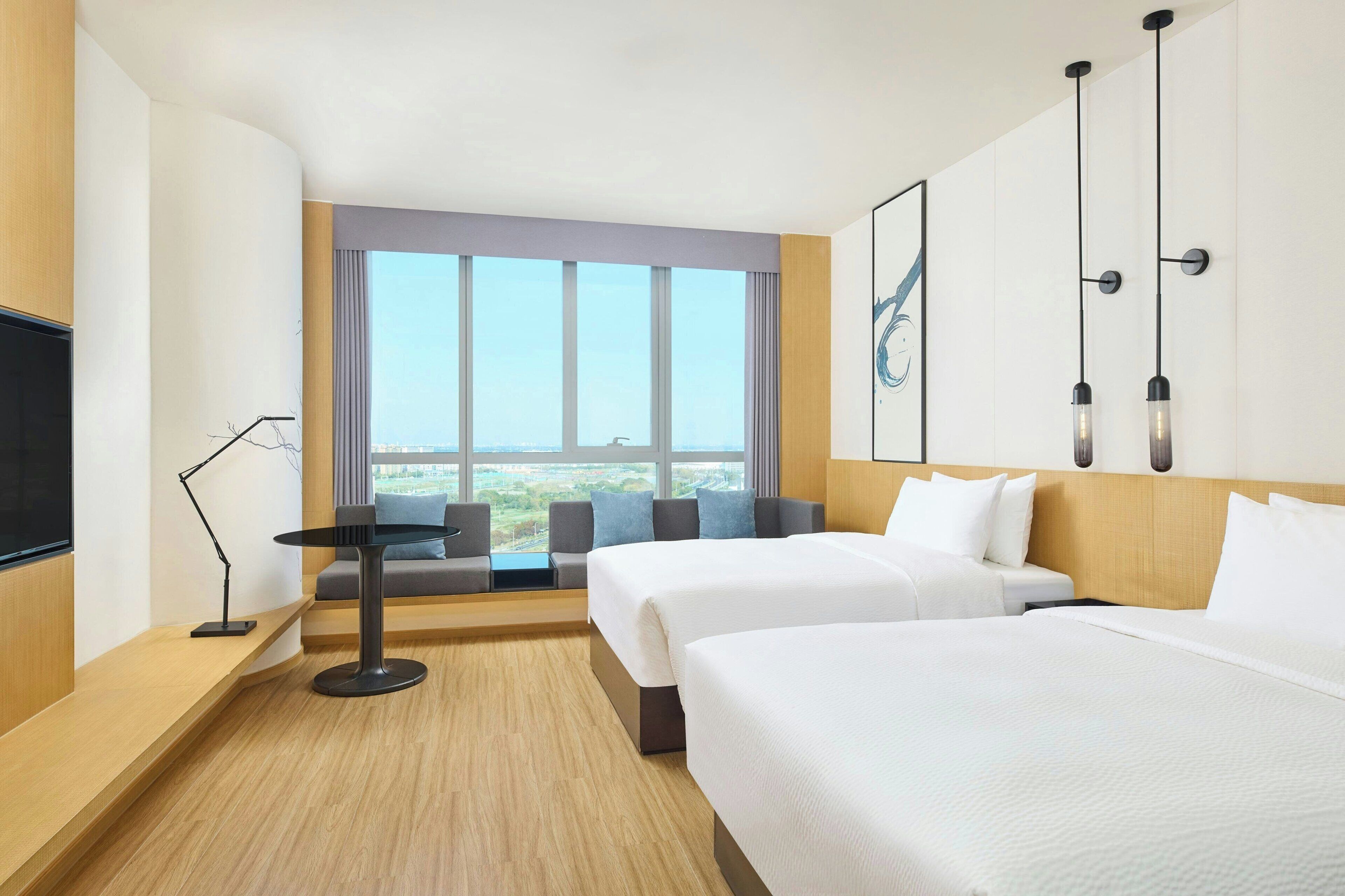 Premium bedding, down duvets, blackout curtains, soundproofing