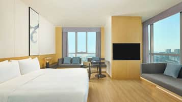 Standard Room, 1 King Bed, City View | Premium bedding, down comforters, blackout drapes, soundproofing