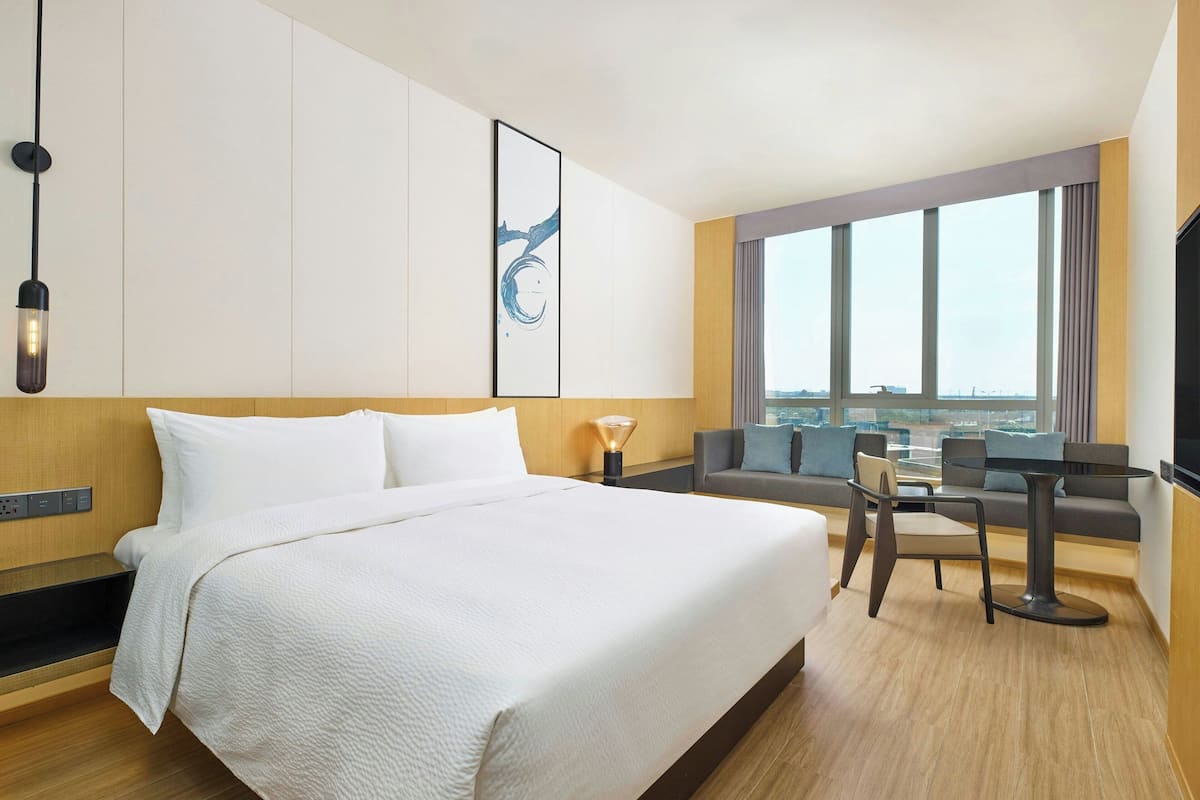 Premium bedding, down duvets, blackout curtains, soundproofing