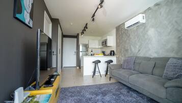 Apartamento Deluxe | Sala de estar