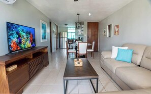 Apartment, Multiple Beds, Kitchen, Pool View (A24828-CEI-COR102) | Living area - Coral 17 Costa Brava Condo, Pool, 5 Min From Beach (Ceiba)