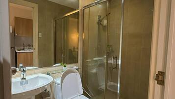 Hair dryer, bidet, towels, soap