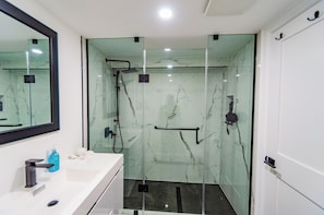 Shower, hair dryer, towels, soap