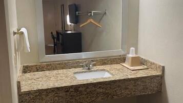 Bathtub, soap, shampoo, toilet paper