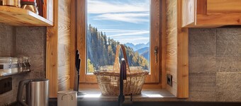 Chalet 'Casa Promindoz' with Mountain View, Private Garden and Relaxation