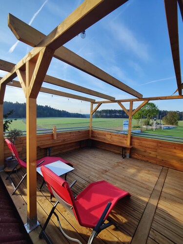 Cozy loam log with integrated wall heating, invites you to relax!