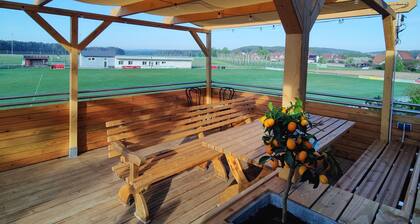 Cozy loam log with integrated wall heating, invites you to relax!