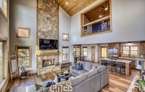 TV, fireplace - Panoramic Mountain & Sunset View · 3 King Suites · Sauna · XL Hot Tub · Fire Pit (Ellijay)