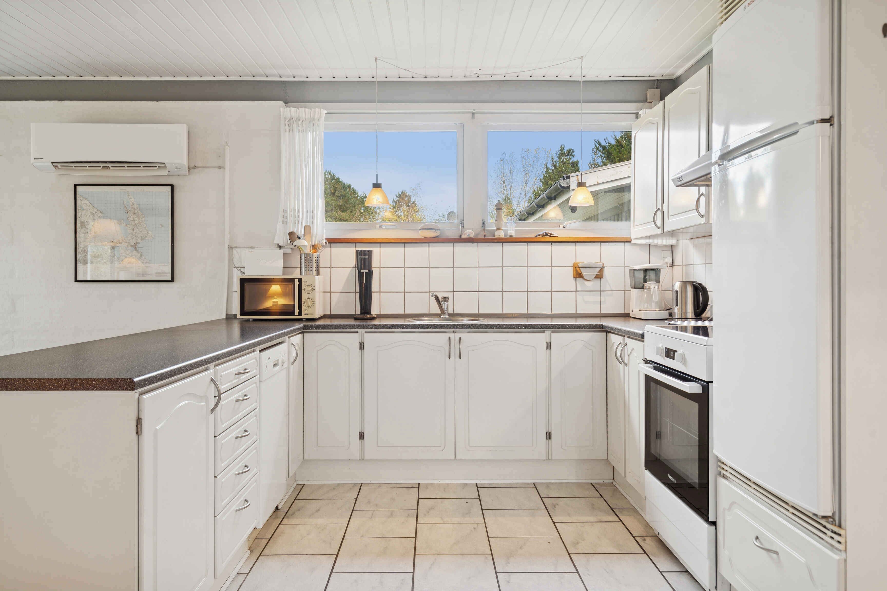 Frigorífic, forn, placa de cuina i rentaplats 