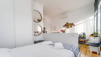 Een strijkplank/strijkijzer, gratis wifi, beddengoed