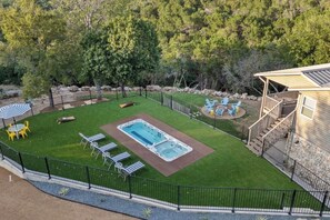 A backyard with a hot tub, a fire pit, and outdoor seating. - 3 Kings! Hot Tub/Pool-Fire Pit-GameRm GYM+ PickleB (Canyon Lake)