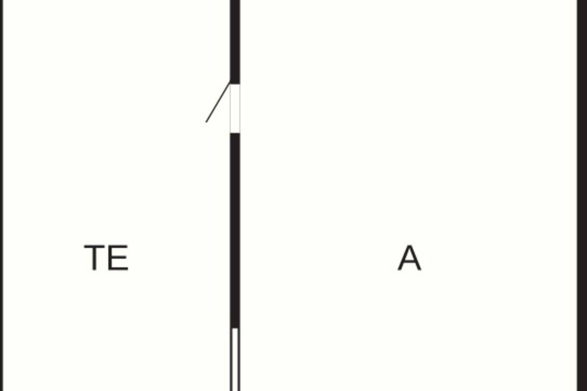 Um quarto com layout alongado e estreito, dividido em três áreas identificadas como TE, K e A.