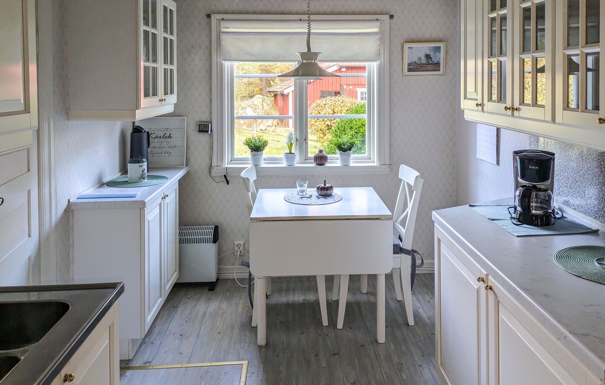 Fridge, stovetop, dishwasher, coffee/tea maker