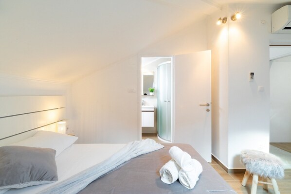 Apartemen | 2 kamar tidur, setrika/meja setrika, dan seprai linen