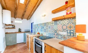 Fridge, oven, coffee/tea maker, cookware/dishes/utensils