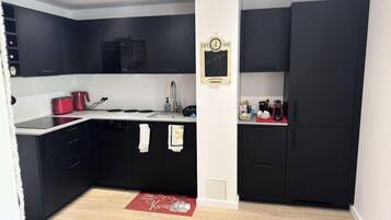 Dishwasher, coffee/tea maker, cookware/dishes/utensils