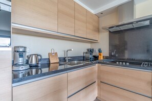 Private kitchen - 4-person Corner Apartment With a Beautiful View (De Koog)