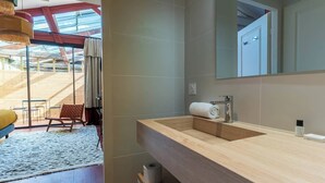A modern bathroom with a wooden vanity, a large mirror, and a view of the outdoors. - Large Magna room with private terrace (Bordeaux)