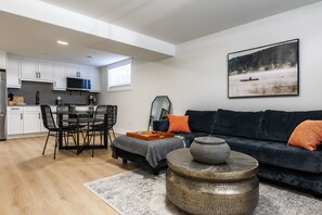 Living area - Modern Luxury Basement Suite • Minutes From Falls (Niagara Falls)