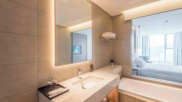 Shower, jetted tub, hair dryer, bidet