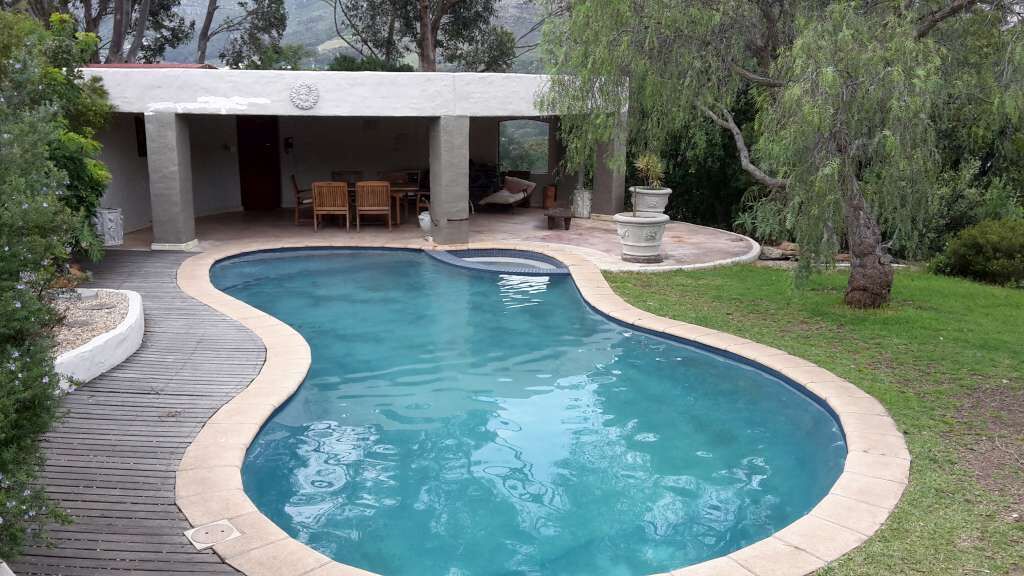 Outdoor pool, pool umbrellas, pool loungers