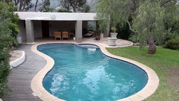 Outdoor pool, pool umbrellas, sun loungers