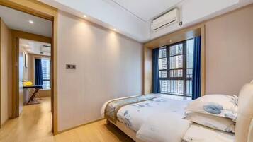 Desk, laptop workspace, blackout drapes, soundproofing