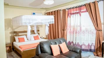 Habitación doble Deluxe, vista a la ciudad | Wifi gratis y ropa de cama