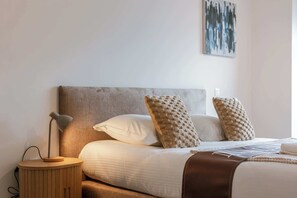 2 dormitorios, tabla de planchar con plancha, wifi y ropa de cama