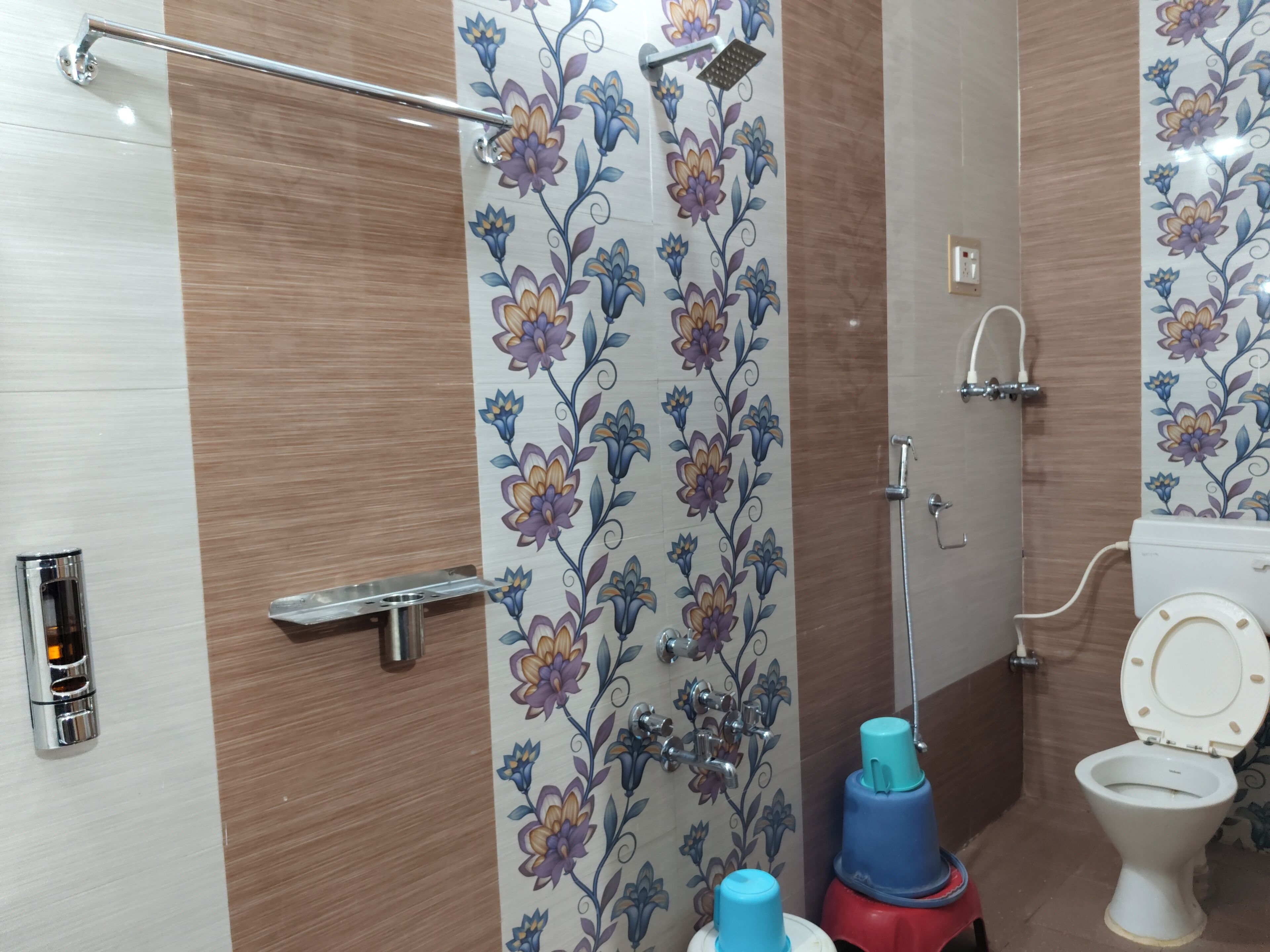 Shower, towels, soap, toilet paper