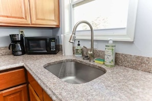 Fridge, microwave, stovetop, coffee/tea maker - Sojourn | Ocean Hideaway unit 4 | 2 Bedroom (Norfolk)