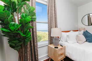3 bedrooms, desk, iron/ironing board, travel cot - Sojourn Beach Front Escape Balcony & Beach Access (Norfolk)