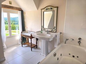 Jetted bath, hair dryer, towels, soap