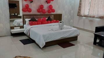 Premium bedding, down comforters, desk, laptop workspace