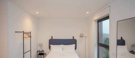 1 غرفة نوم ومكواة/لوح كي وواي فاي وملاءات أسرّة